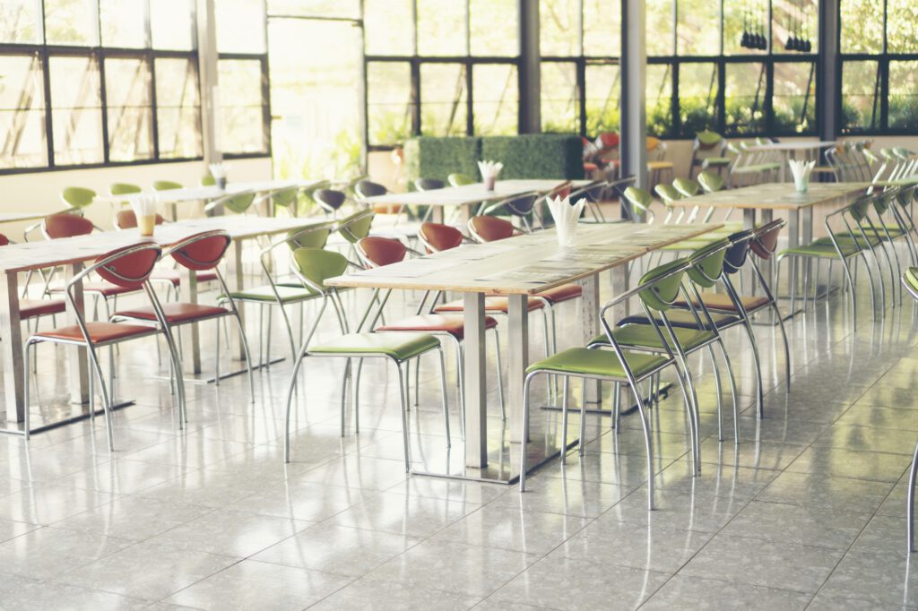 Tables and chairs empty in canteen